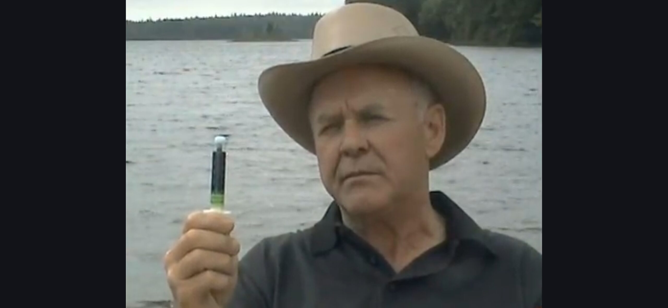 Rick Simpson holding oil while describing hemp as medicinal in early documentary footage